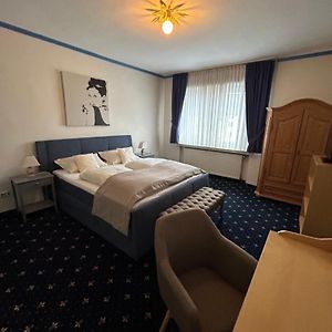 Kamer met een Queen Size Bed